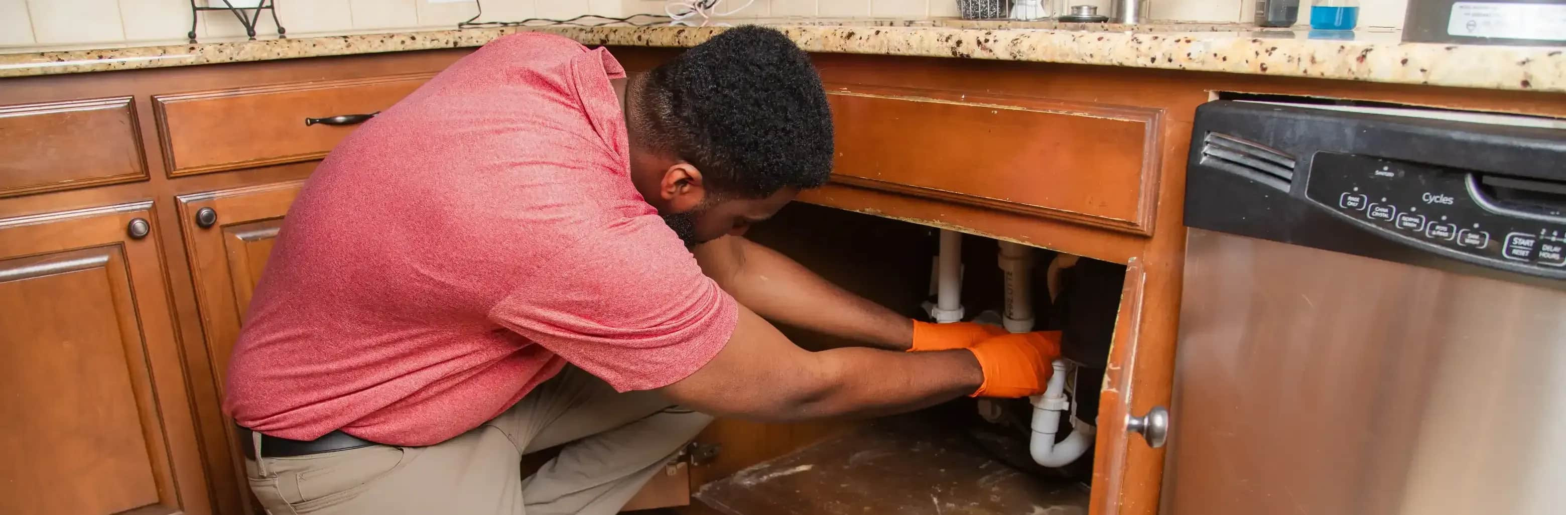 Team Enoch Plumber Repairing Pipe