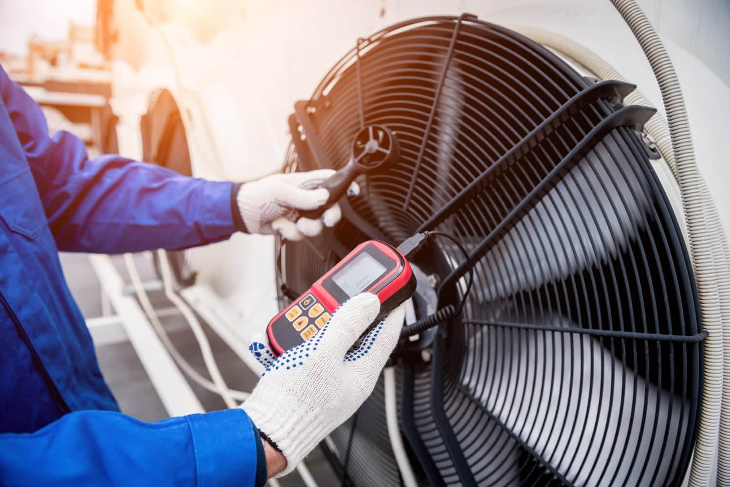 testing-with-anemometer-axial-fan-condensing-unit