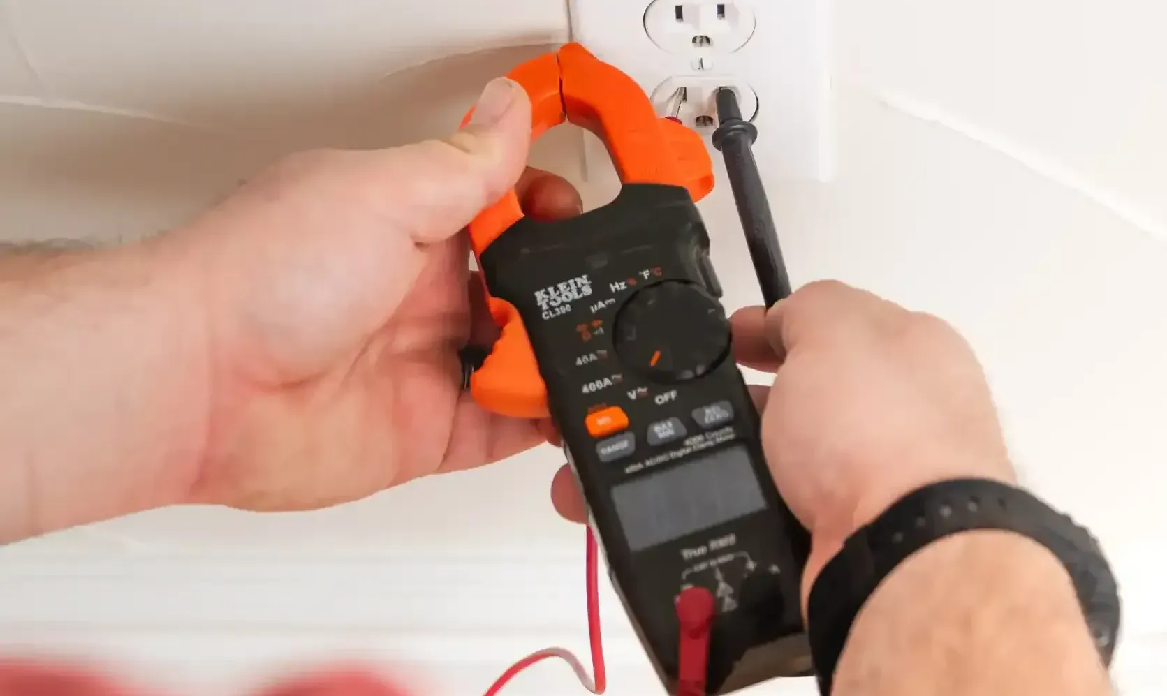 Electrician checking switch