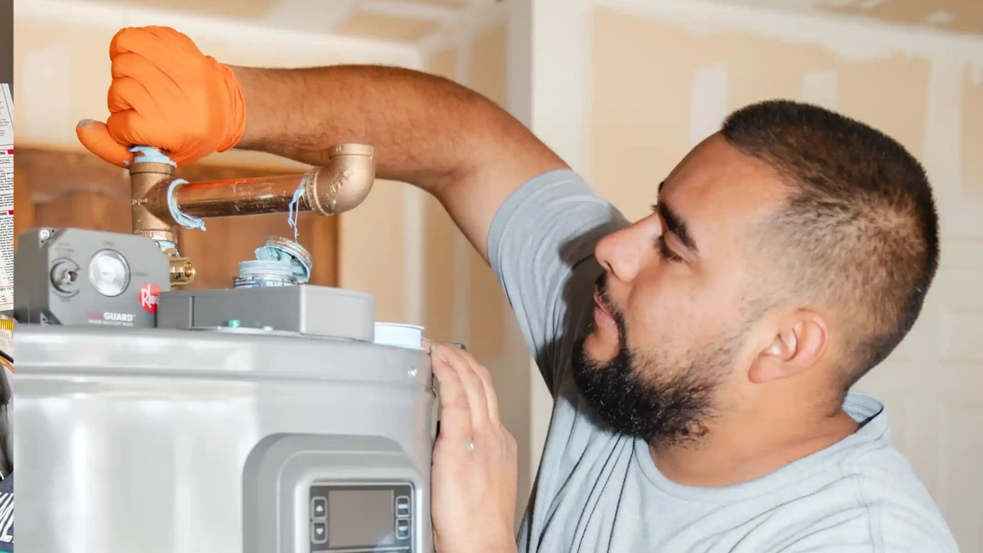 Team Enoch technician installing water heater