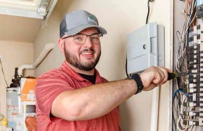 technician checking electric panels